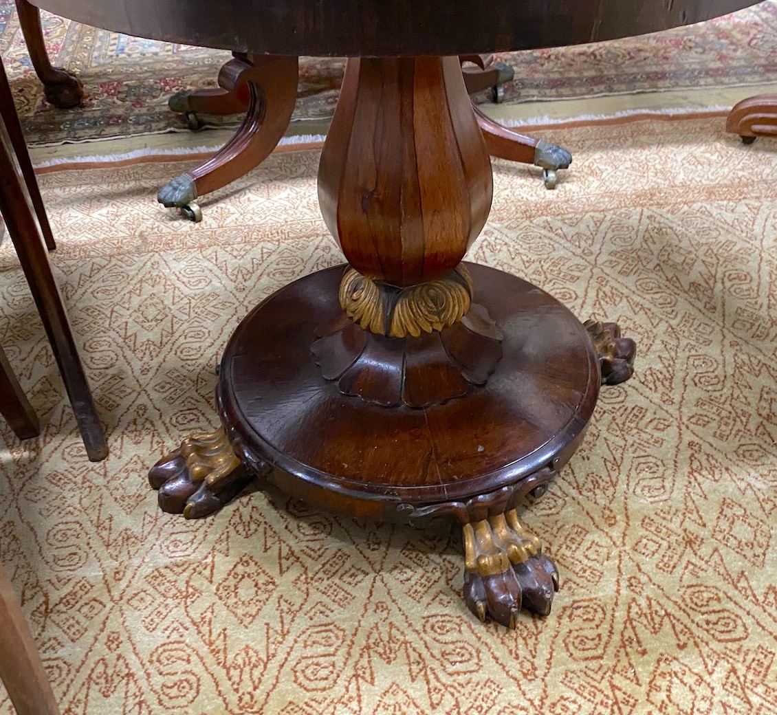 A Victorian parcel gilt rosewood pedestal now as an occasional table with circular faux porphyry marble top diameter 73cms, height 62cms.